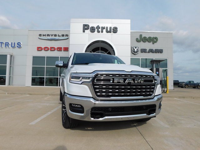2026 RAM Ram 1500 RAM 1500 LIMITED LONGHORN CREW CAB 4X4 5'7' BOX in Bright White Clear-Coat Exterior Paint — front three-quarter view