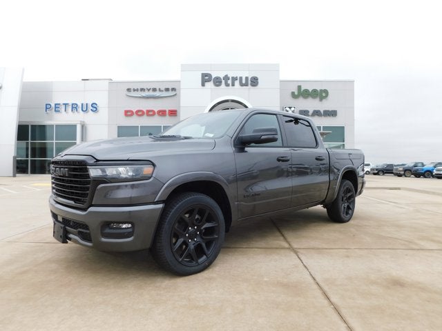 2026 RAM Ram 1500 RAM 1500 LARAMIE CREW CAB 4X4 5'7' BOX in Granite Crystal Metallic Clear-Coat Exterior Paint — front three-quarter view
