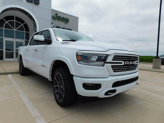 2021 RAM 1500 Laramie Crew Cab 4x4 5'7' Box in Bright White Clearcoat — front three-quarter view