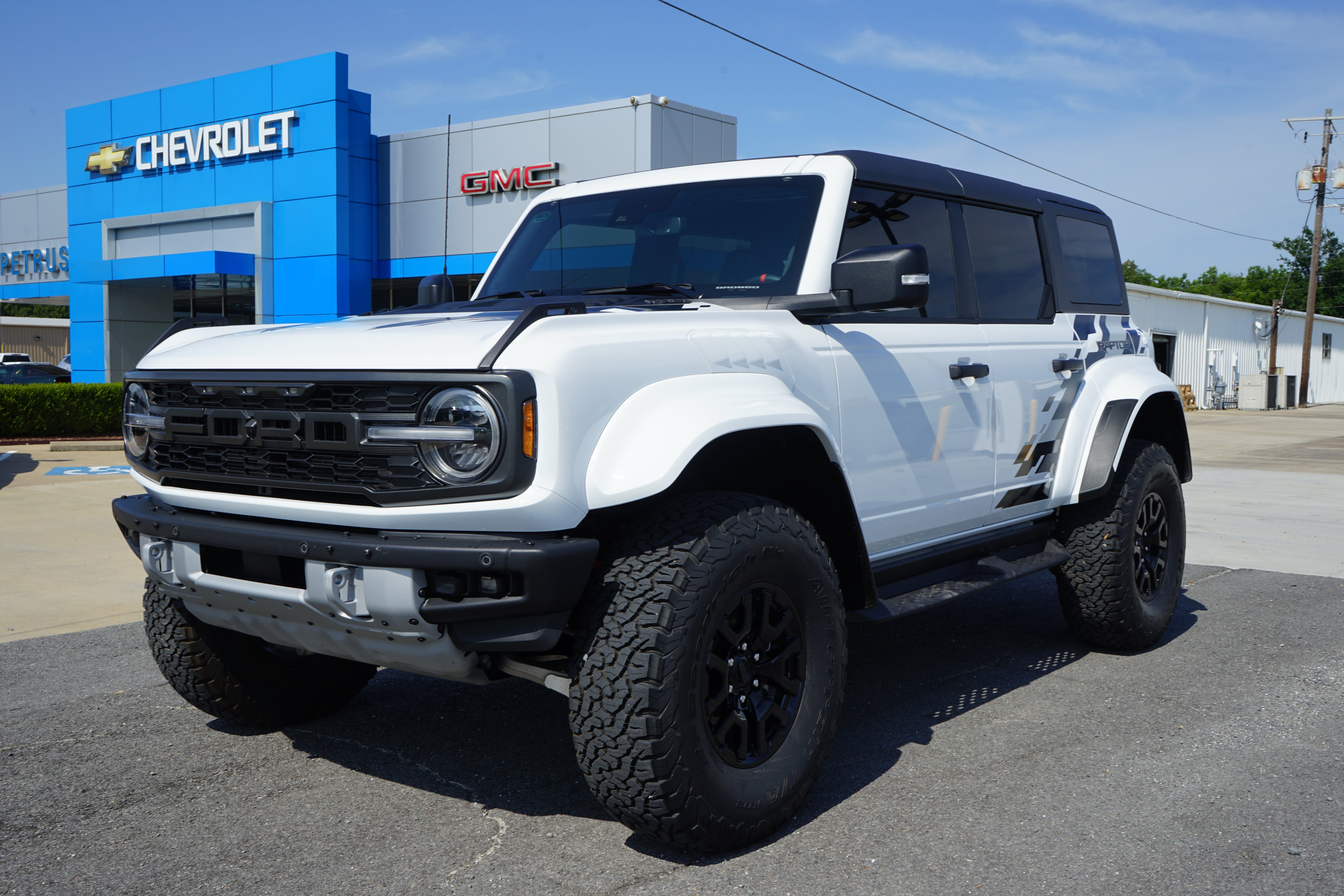 2024 Ford Bronco Raptor in White — front three-quarter view