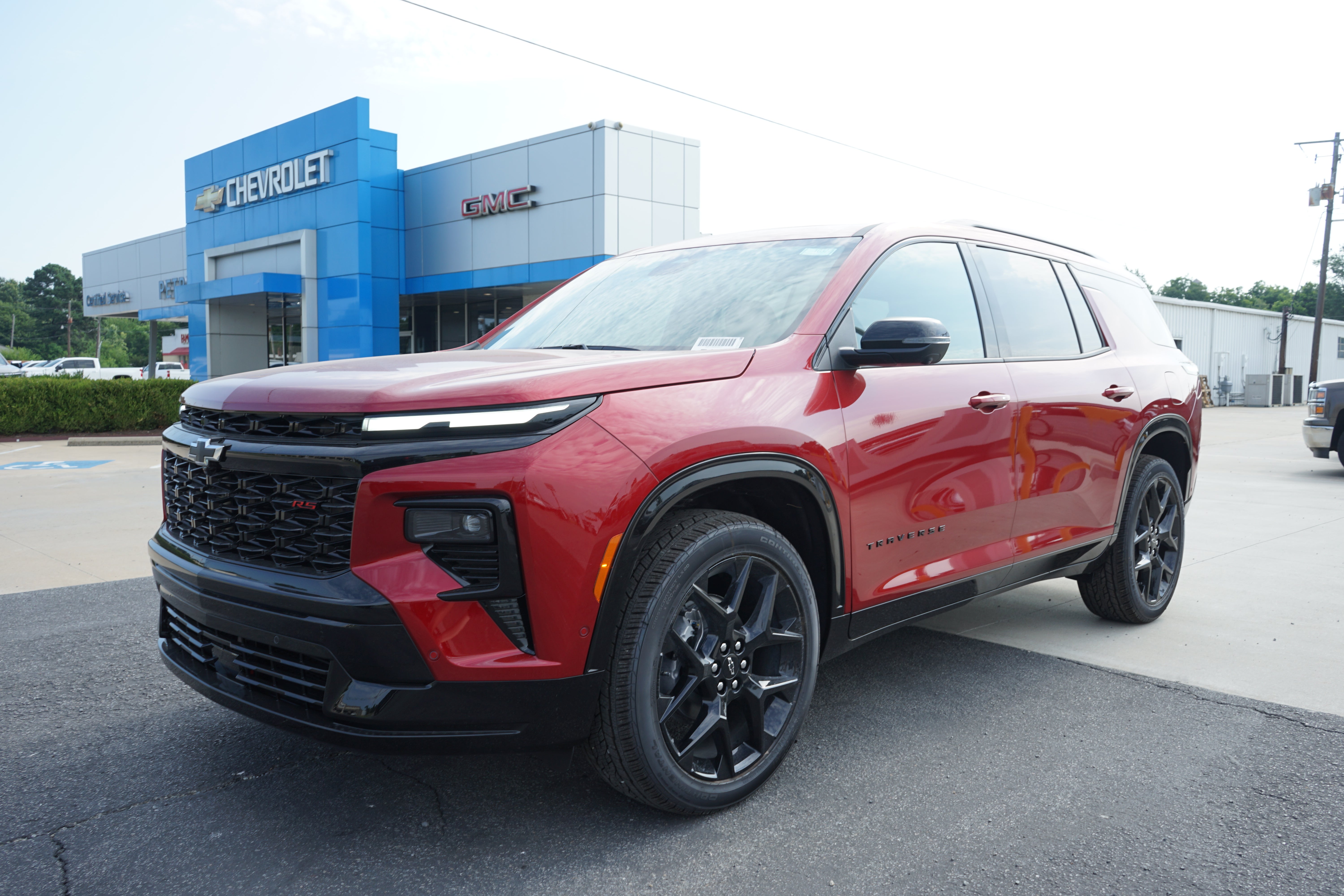 2026 Chevrolet Traverse RS in Radiant Red Tintcoat — front three-quarter view