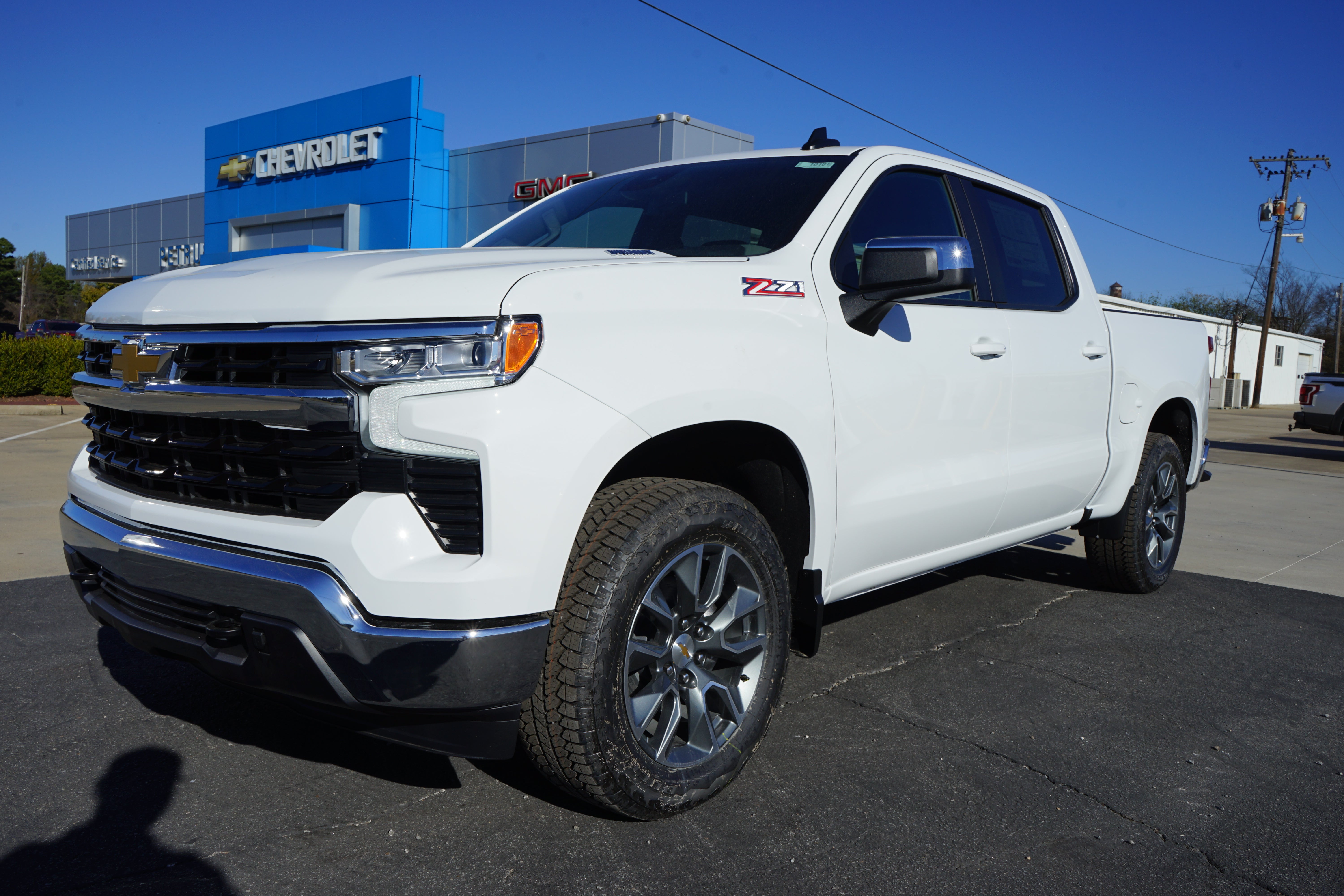 2026 Chevrolet Silverado 1500 LT in Summit White — front three-quarter view