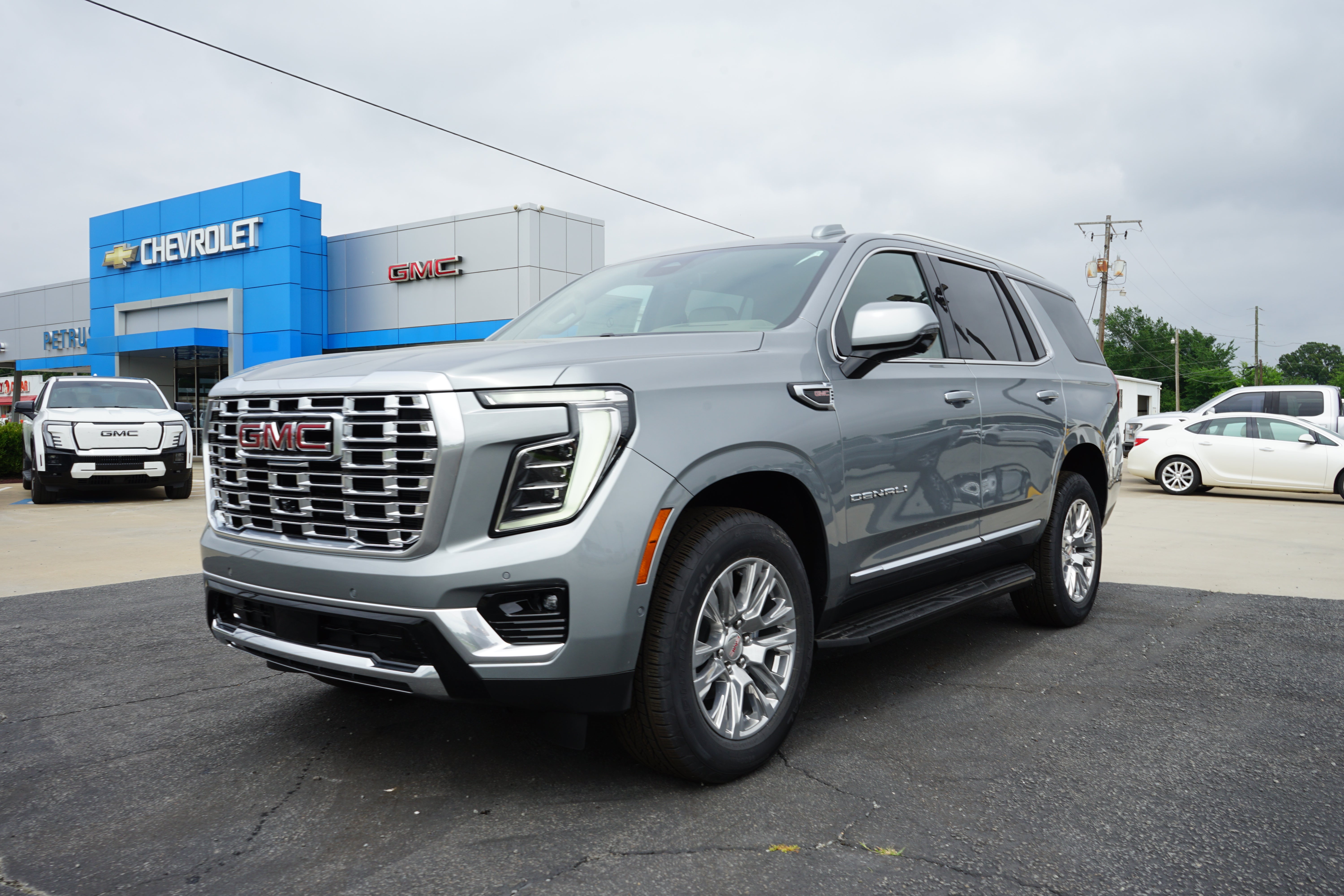 2026 GMC Yukon Denali in Sterling Metallic — front three-quarter view