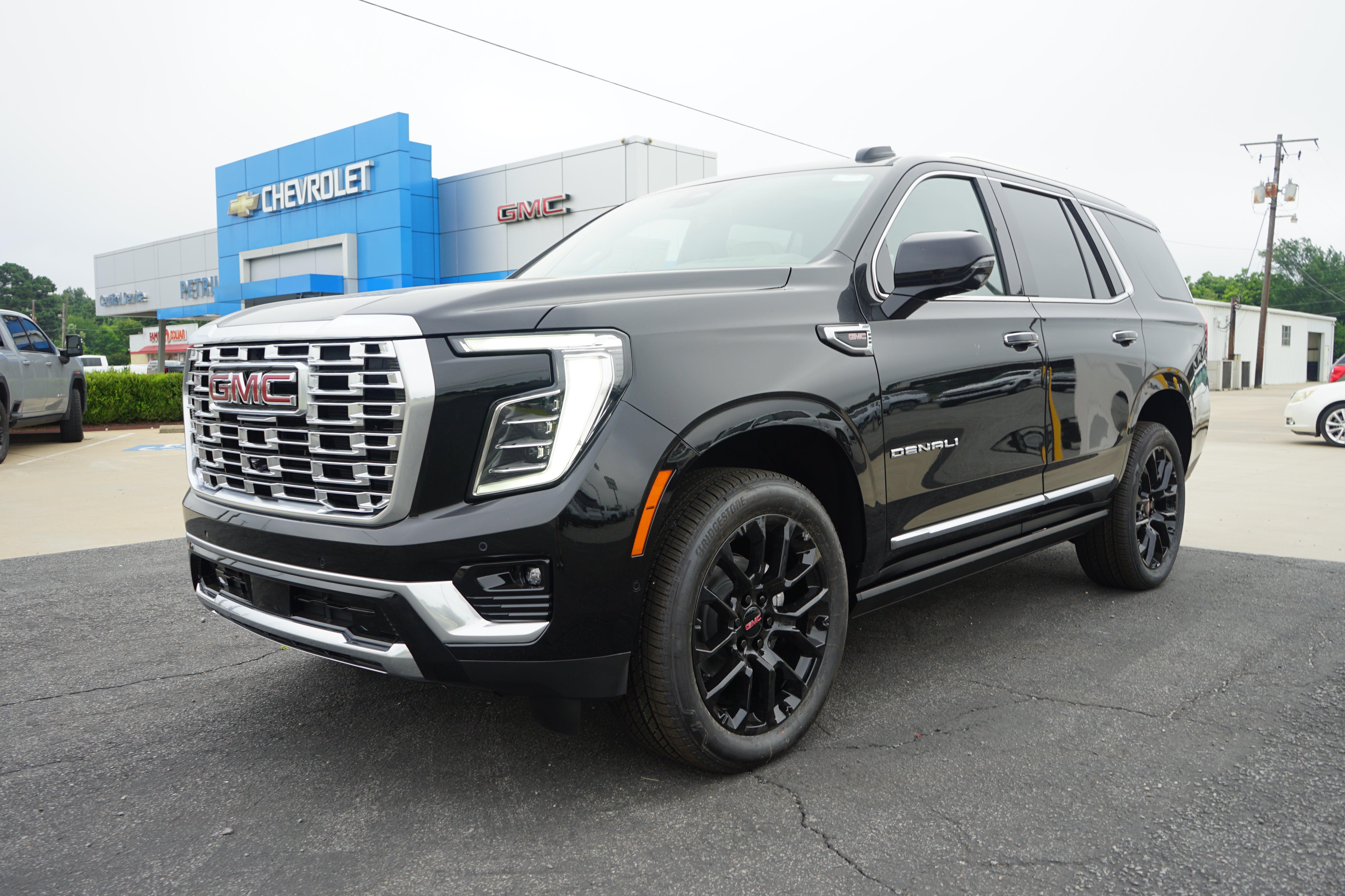 2026 GMC Yukon Denali in Onyx Black — front three-quarter view
